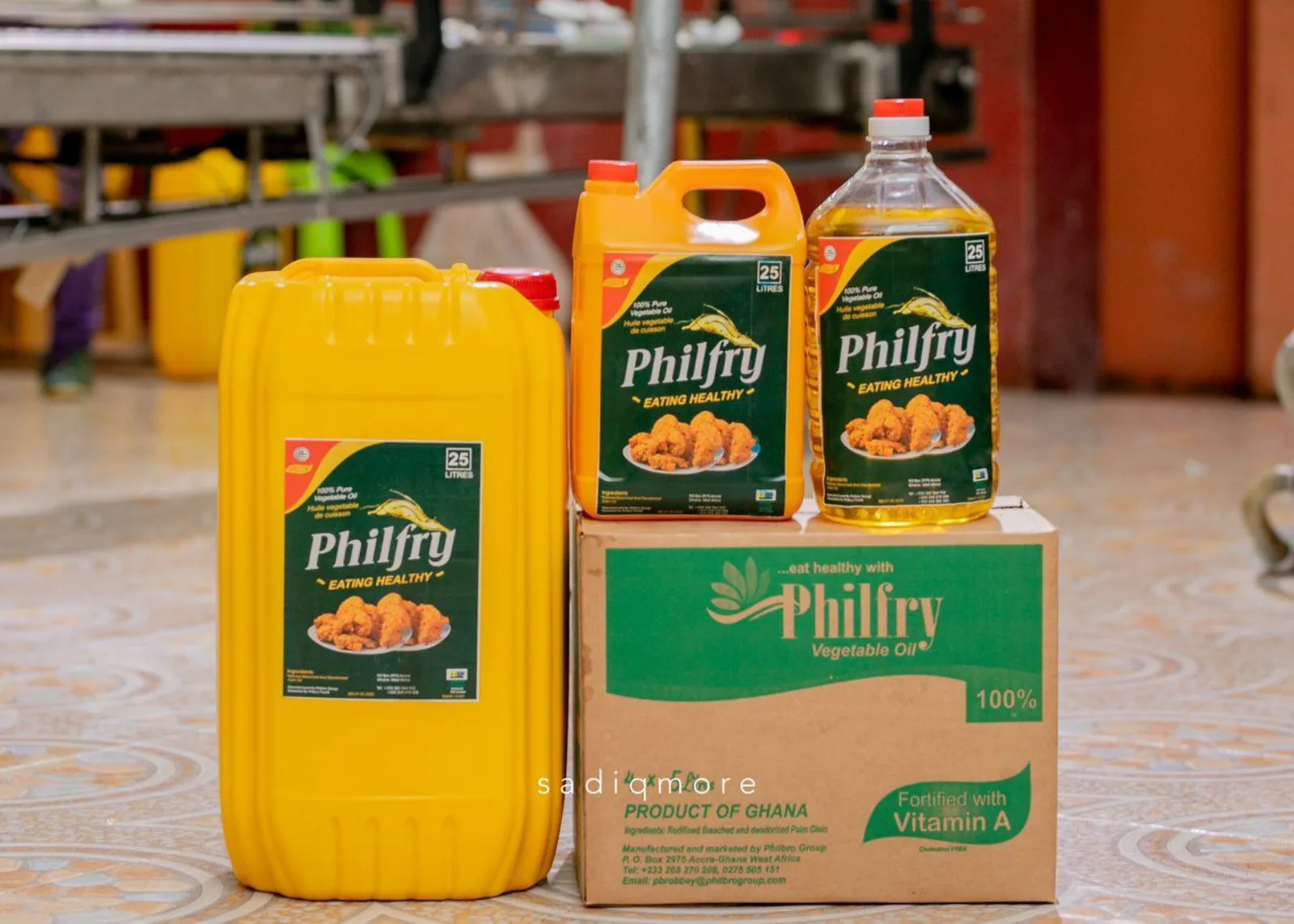 Philfry vegetable oil range — jerry can, jug and PET bottle on a branded carton